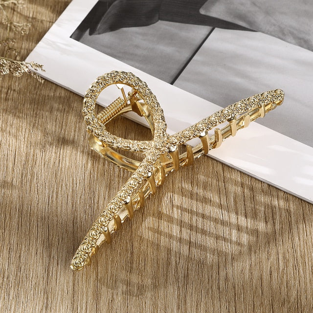 Pinza para el pelo con forma de cangrejo y perlas de cristal